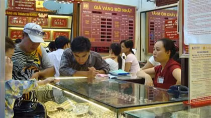 Vàng vượt mốc 34 triệu đồng/lượng