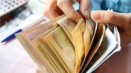 Mức lương cơ sở đối với cán bộ, công chức là 1.210.000 đồng/tháng 