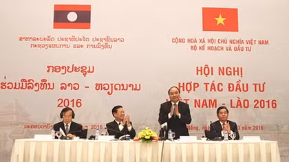 Việt - Lào cam kết cải thiện môi trường đầu tư