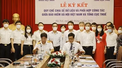 Bảo hiểm xã hội Việt Nam và Tổng cục Thuế ký Quy chế chia sẻ dữ liệu và phối hợp công tác
