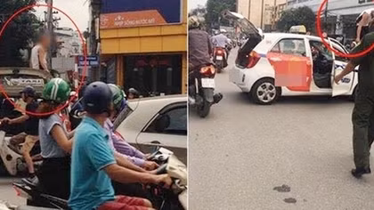 Tài xế taxi leo lên nóc xe "ăn vạ" CSGT