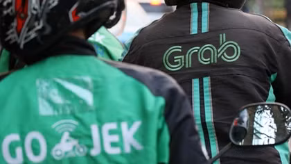 Cuộc chiến giành thị phần khốc liệt giữa Grab và Go-Jek