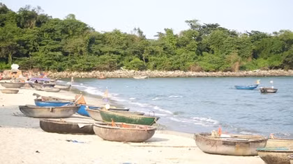Trải nghiệm bình minh trên vịnh Nam Ô bằng thuyền thúng