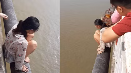Bà mẹ bỏ con trên cầu định nhảy xuống sông Hồng tự tử