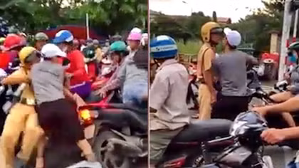 Người dân hỗ trợ CSGT khống chế kẻ chống người thi hành công vụ
