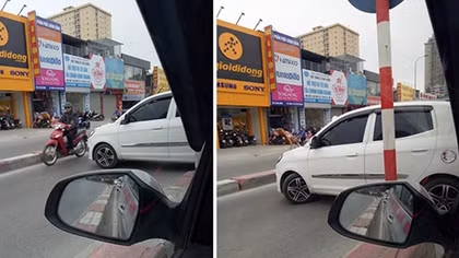Kia Morning hồn nhiên quay đầu trên cầu vượt Lê Văn Lương