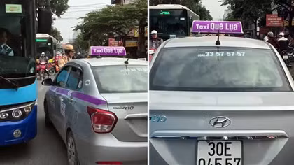 Cảnh sát giao thông bị taxi đẩy trên phố Minh Khai