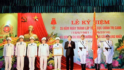 Chủ tịch nước Trần Đại Quang dự Lễ mít tinh kỷ niệm 35 năm Ngày truyền thống Tổng cục Chính trị CAND