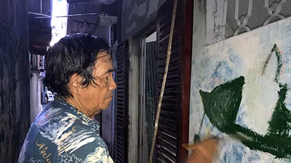 Người chuyên "mặc áo" cho các con hẻm TP HCM