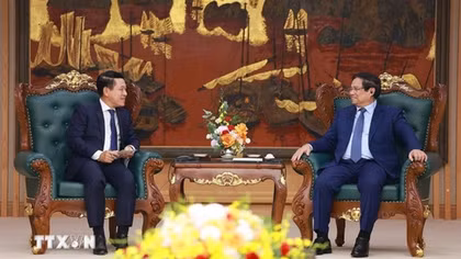 Việt Nam sẵn sàng trao đổi kinh nghiệm với Lào về tái cơ cấu doanh nghiệp