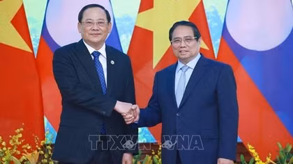 Thủ tướng Phạm Minh Chính gặp Thủ tướng Lào Sonexay Siphandone nhân Hội nghị thượng đỉnh P4G