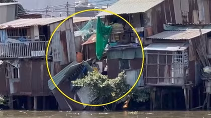 Sập nhà, người phụ nữ đang nằm võng rơi xuống kênh