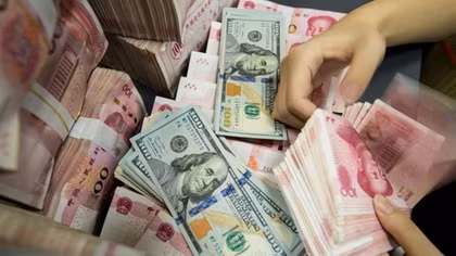 Vì sao Nhân dân tệ tăng giá so với USD?