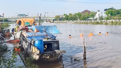 Nhặt quần áo rơi, người đàn ông khuyết tật té sông tử vong