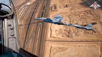 Su-35S mang tên lửa hộ tống ông Putin thăm Trung Đông