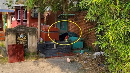 Người đàn ông chết trong tư thế vắt ngang trên ngôi mộ