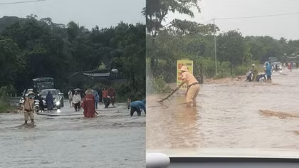 Lực lượng Công an dầm mưa hỗ trợ người dân