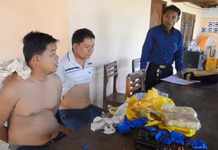 Đon Chăn và Thảo Kẹo sau khi bị bắt.