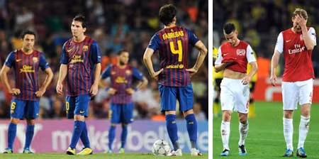 Cầu thủ Barca buồn thảm sau bàn thua ở phút bù giờ, còn cầu thủ Arsenal thất vọng với một bàn thua phút cuối.