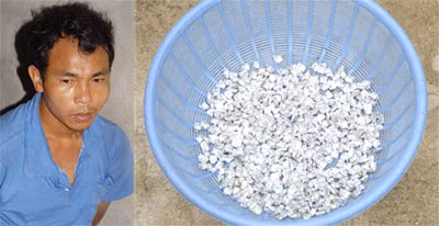 Đối tượng Phạm Văn Nam và tang vật vụ án.