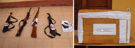 Súng đạn và tang vật heroin bị thu giữ.