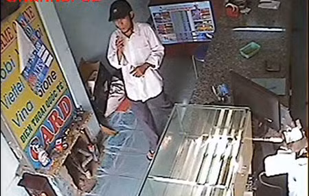 Dàn cảnh trộm 100 triệu đồng card điện thoại ảnh 1