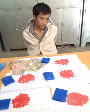 Đối tượng Vì Văn Thân và tang vật.