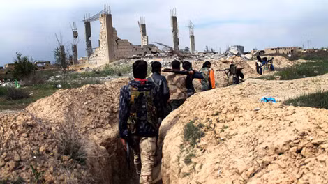 Chiến binh phe nổi dậy ở thành phố Deir Ezzor, miền bắc Syria ngày 24/3/2014.