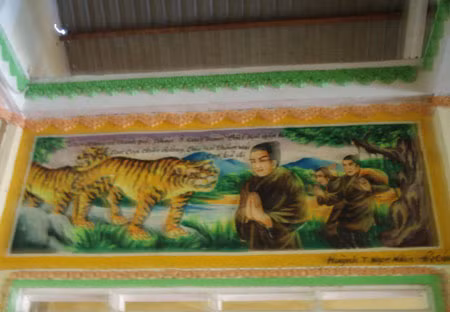 Đạo sĩ Thất Sơn hàng phục thú dữ (Tranh vẽ trong đền thờ quản cơ Trần Văn Thành).