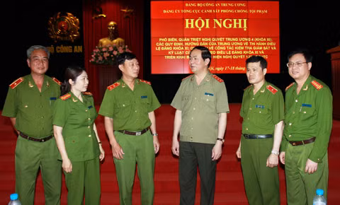 Thượng tướng Trần Đại Quang, Ủy viên Bộ Chính trị, Bộ trưởng Bộ Công an cùng các đại biểu dự Hội nghị.