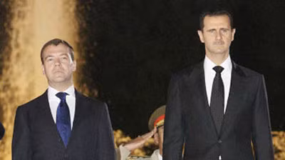 Tổng thống Syria al Assad (phải) và Tổng thống Nga Medvedev.