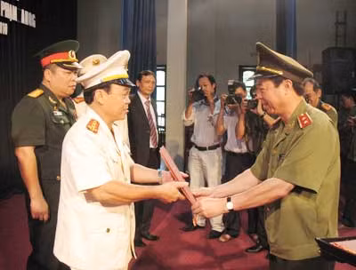 Học viện ANND trao bằng tiến sĩ và bế giảng khóa cao học 15 ảnh 1