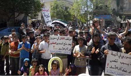 Các cuộc biểu tình chống chính quyền Tổng thống Bashar al-Assad vẫn tiếp diễn trên đường phố ở Syria. Ảnh: Reuters.