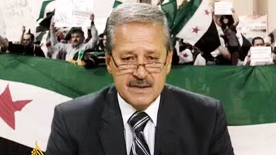 Cựu Đại sứ Syria tại Iraq Nawaf Fares sau ngày đào tẩu.