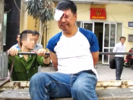 Lương Công Minh bị dẫn giải về cơ quan Công an.
