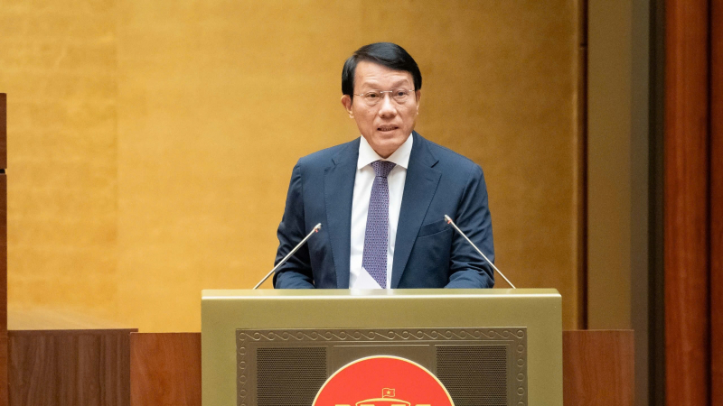 Bộ trưởng Lương Tam Quang trình bày tờ trình dự án Luật Phòng chống ma tuý (sửa đổi).