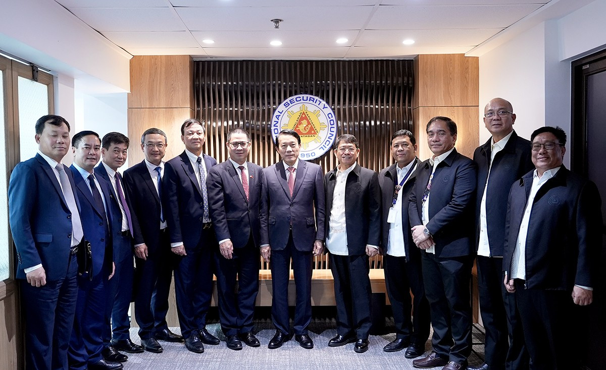 Bộ trưởng Lương Tam Quang dự Lễ ký Hiệp định ASEAN về dẫn độ -1