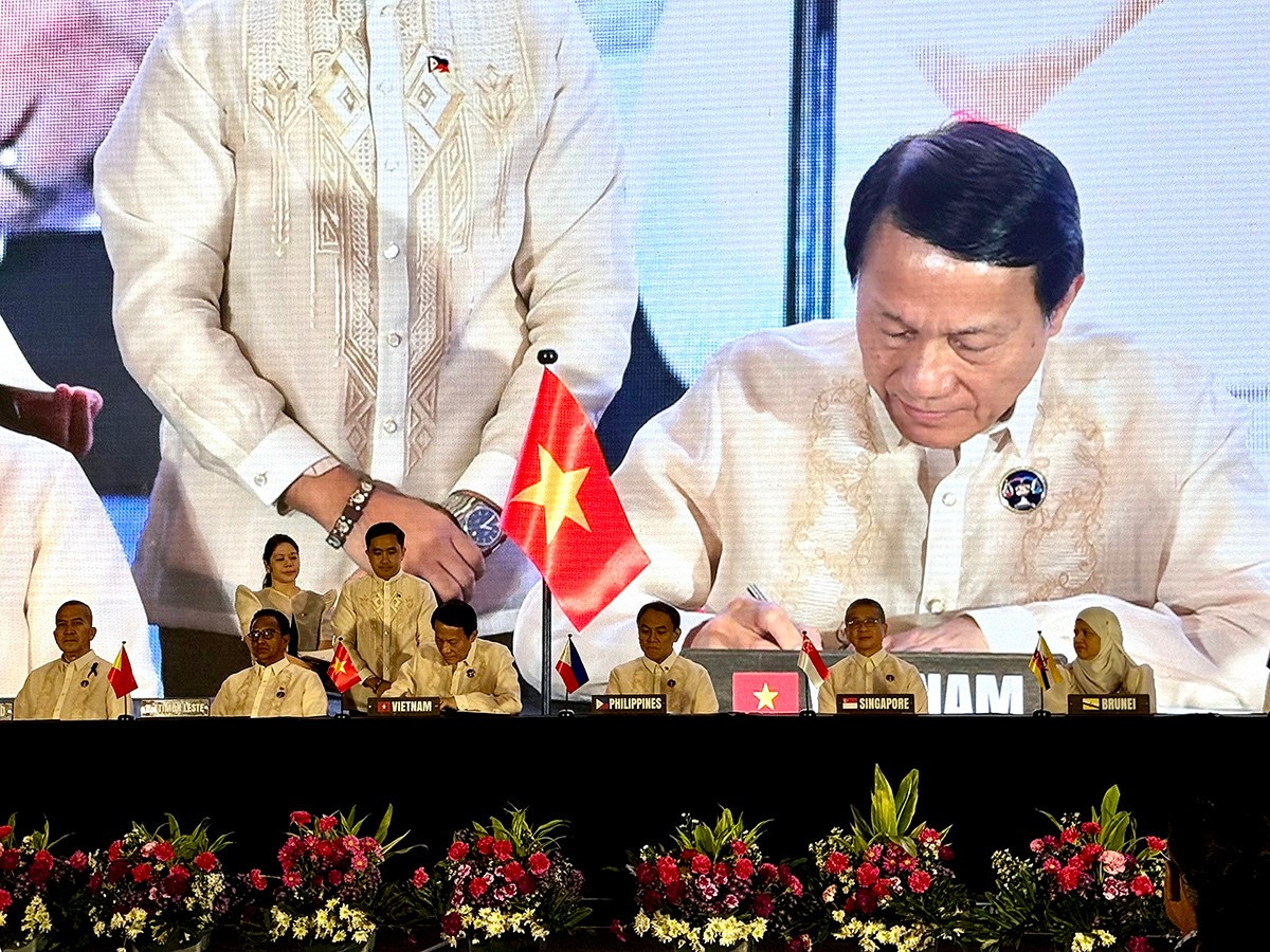 Bộ trưởng Lương Tam Quang dự Lễ ký Hiệp định ASEAN về dẫn độ -0