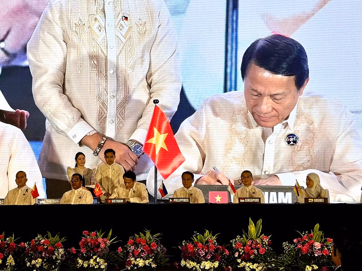 Bộ trưởng Lương Tam Quang dự Lễ ký Hiệp định ASEAN về dẫn độ -0