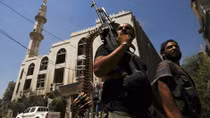 Phiến quân đột kích tòa nhà chính phủ, sát hại 9 cảnh sát Syria