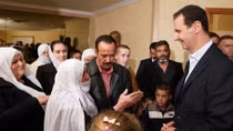 Người dân Syria kiệu Tổng thống Assad lên vai sau khi được giải cứu khỏi tay IS