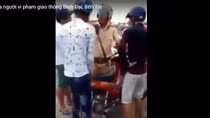 Vi phạm giao thông, điện thoại người thân đến chống đối người thi hành công vụ