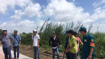 Gần 10 giờ vây bắt đối tượng cướp tài sản trốn trong đám lau sậy