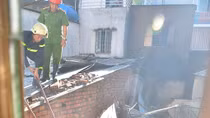  Người phụ nữ bệnh tâm thần nấu ăn gây cháy nhà 