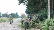 Học viên Trường Cao đẳng ANND 1 giúp dân xây dựng nông thôn mới