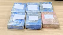 Giấu 6 bánh heroin trong thùng sơn 