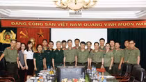Giao lưu, trao đổi nghiệp vụ giữa Báo CAND với Báo QĐND