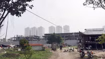 Việc di dời ngôi mộ tập thể ở Thanh Trì là do UBND xã thực hiện