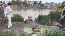 Xác chết không đầu trôi dạt trên sông