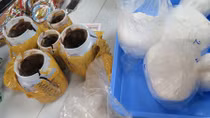 Cụ bà 76 tuổi xuất ngoại cùng 9 bánh heroin